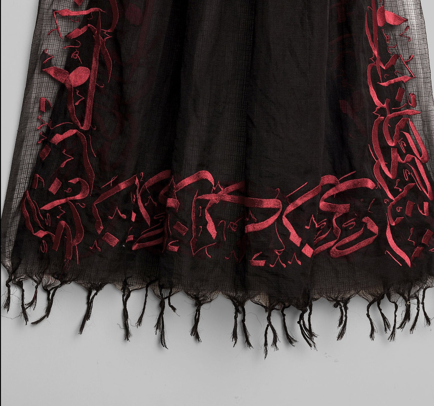 
                  
                    Zindagi Gulzaar Hai Embroidered Calligraphy Shawl- Black
                  
                