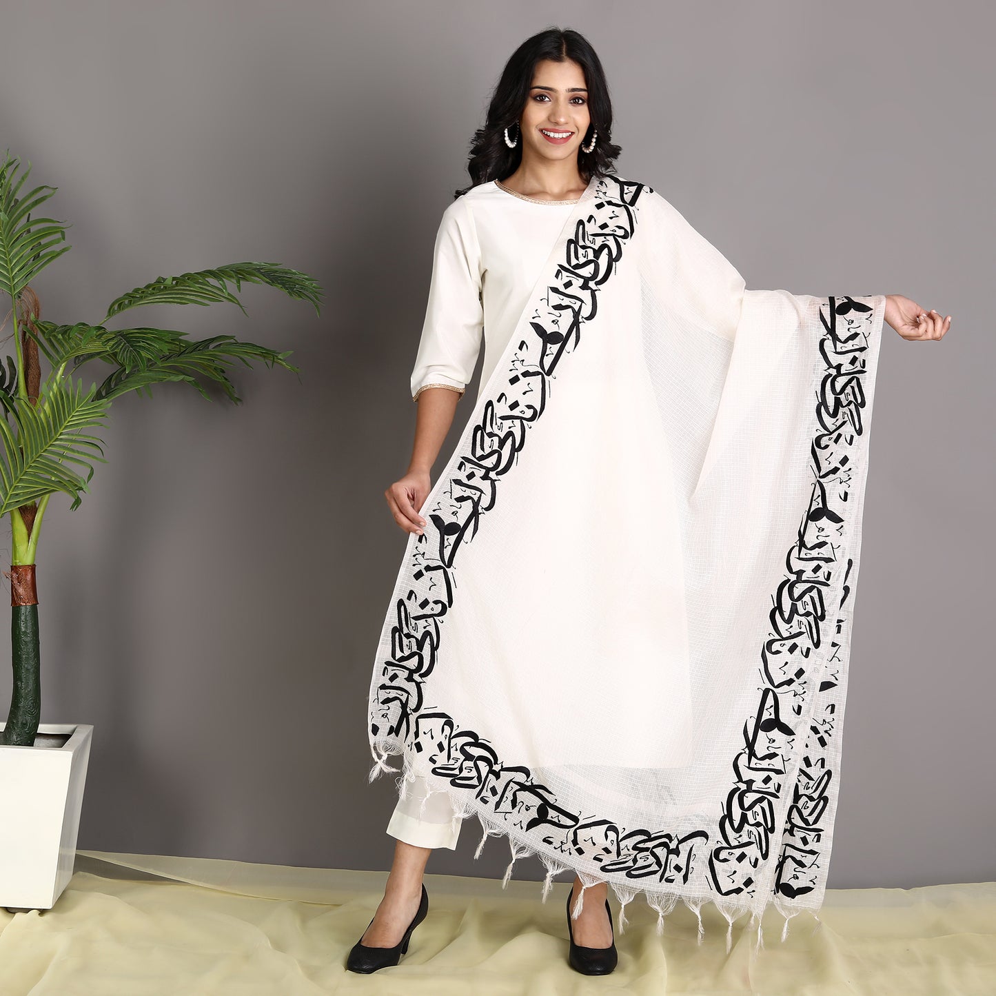 
                  
                    Zindagi Gulzaar Hai Embroidered Calligraphy Shawl-White
                  
                