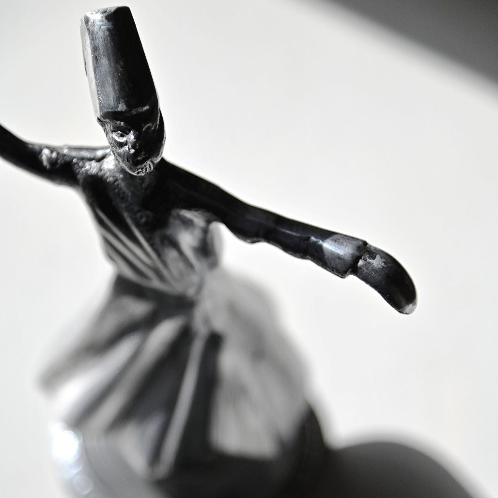 
                  
                    7" Whirling Sufi Dervish Statue - Tarnished Silver
                  
                