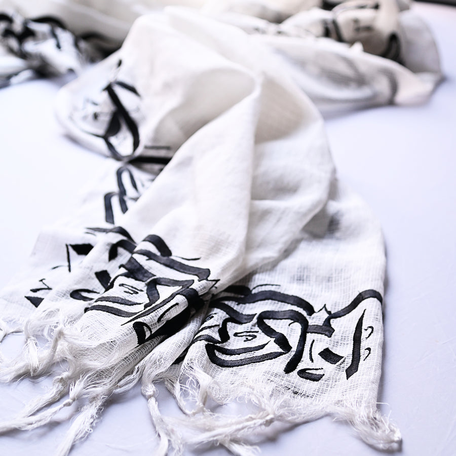 
                  
                    Zindagi Gulzaar Hai Embroidered Calligraphy Shawl-White
                  
                